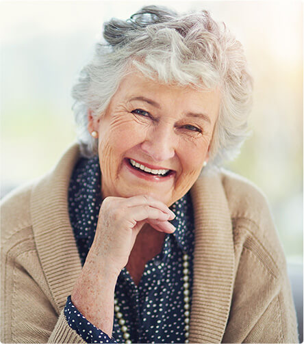 senior woman with a bright, white smile