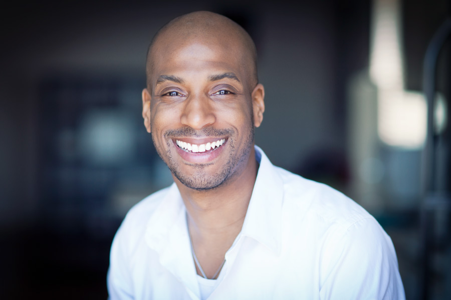 Handsome, smiling black man with a beautiful smile.